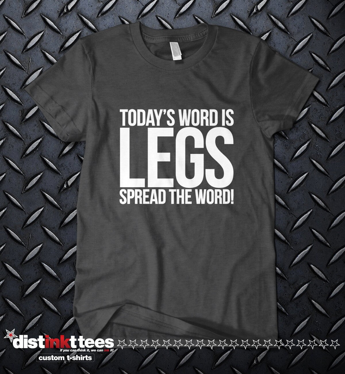 black tshirt lying on a metallic surface